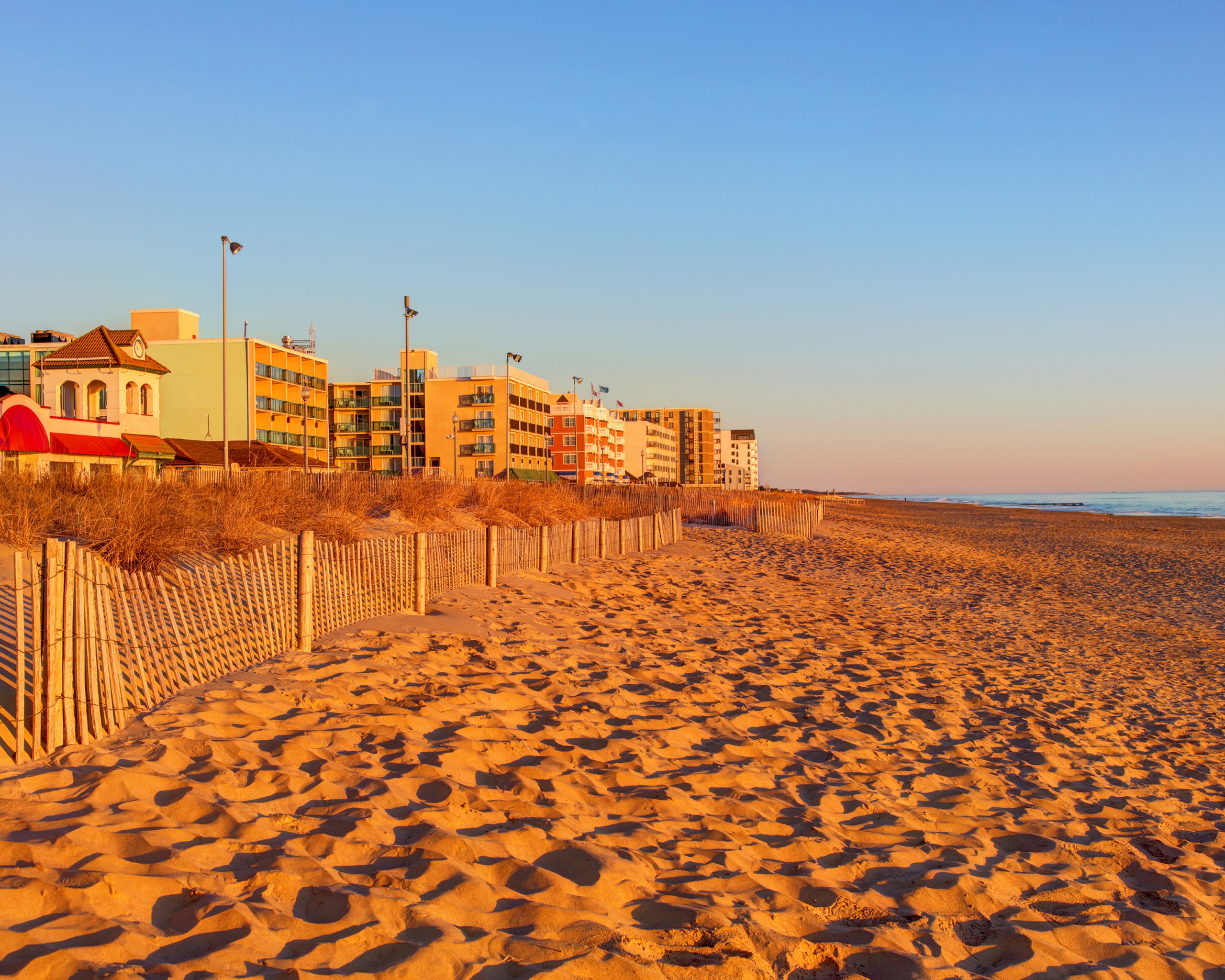 Ocean City beach with hotels at sunset.