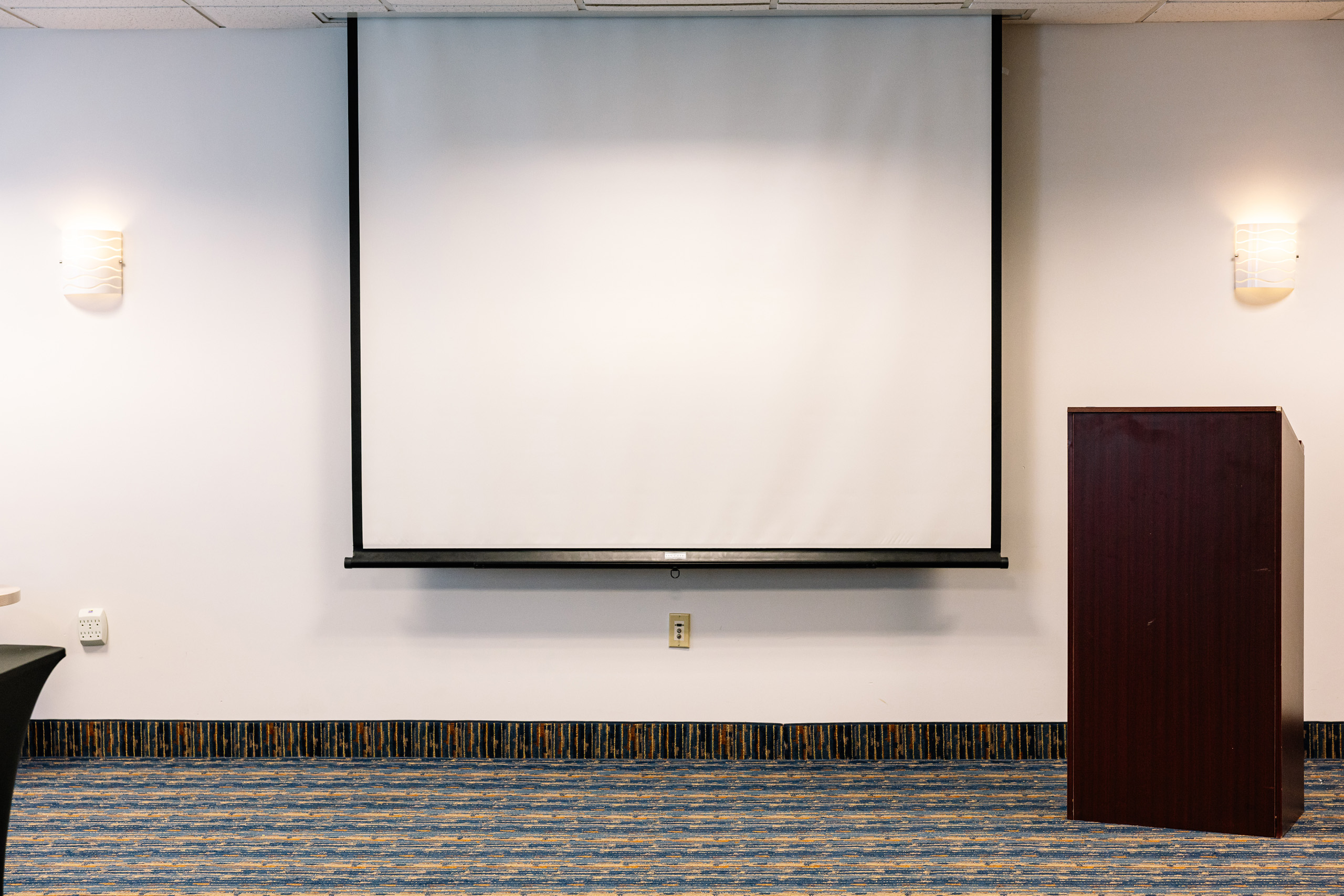 meeting room with screen and podium