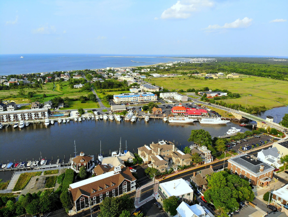 Aerial view of Lewes Delaware with views of ocean and landscape and buildings